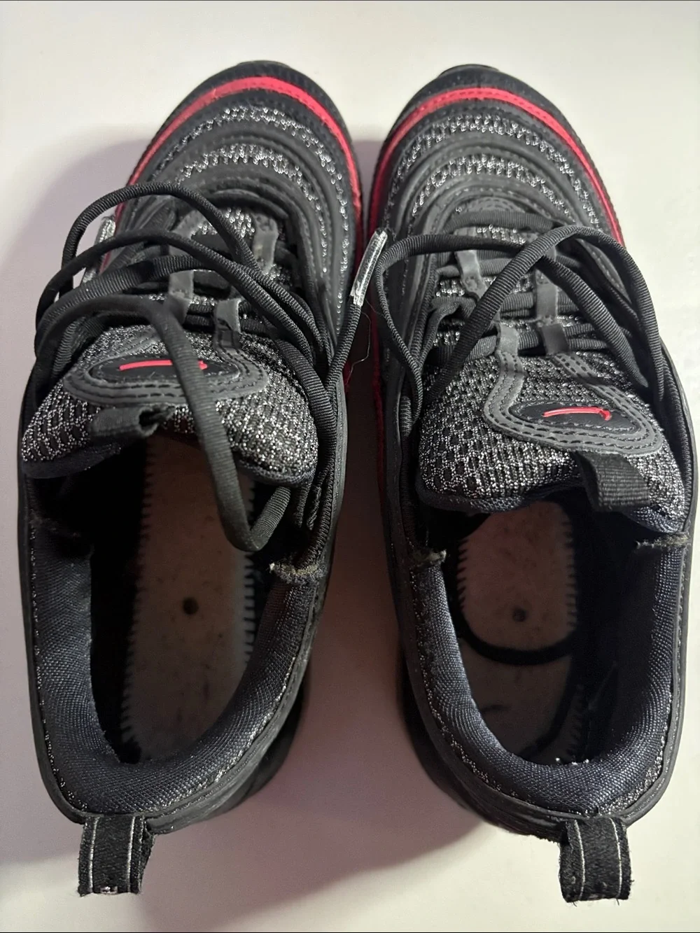 Unisex Nike AirMax (6) Black Sneakers with Red Trim.